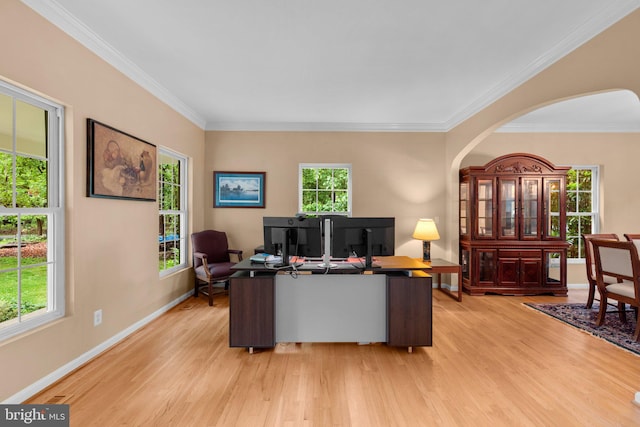 15066 Frederick Rd, Cooksville, MD 21723 - home office with light wood finished floors, arched walkways, ornamental molding, and baseboards