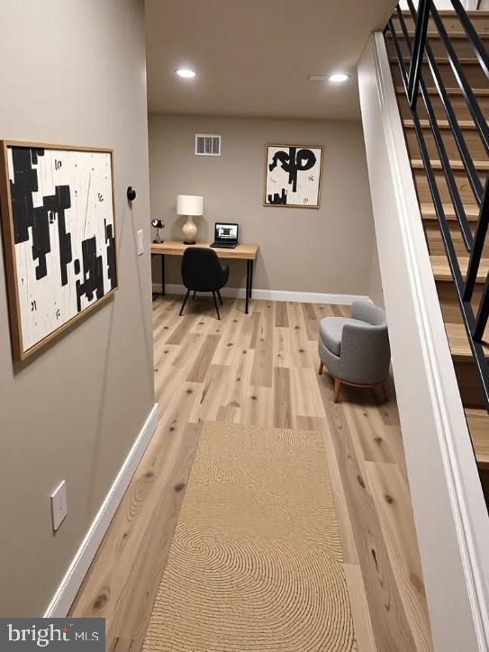 2563 Emerald St, Philadelphia, PA 19125 - corridor with wood finished floors, stairs, baseboards, and recessed lighting