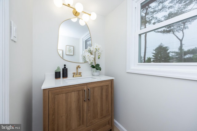 127 Toledo Ln, Willingboro, NJ 08046 - bathroom with plenty of natural light, vanity, and baseboards