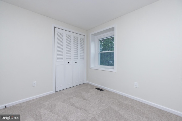 127 Toledo Ln, Willingboro, NJ 08046 - unfurnished bedroom featuring carpet, a closet, and baseboards