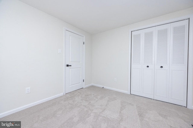 127 Toledo Ln, Willingboro, NJ 08046 - unfurnished bedroom featuring carpet flooring, baseboards, and a closet