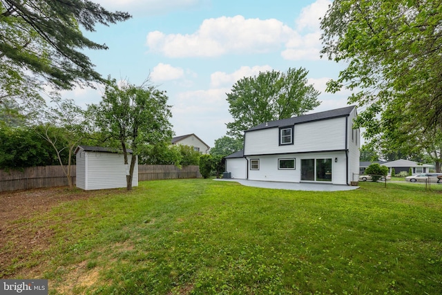 127 Toledo Ln, Willingboro, NJ 08046 - back of house with a patio area, a shed, and an outbuilding