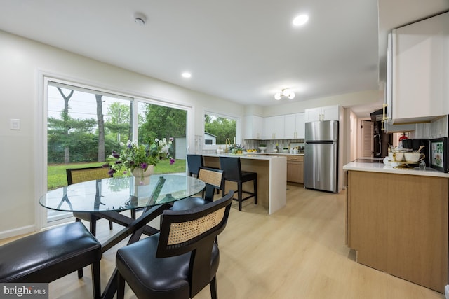 127 Toledo Ln, Willingboro, NJ 08046 - dining area featuring light wood finished floors and recessed lighting