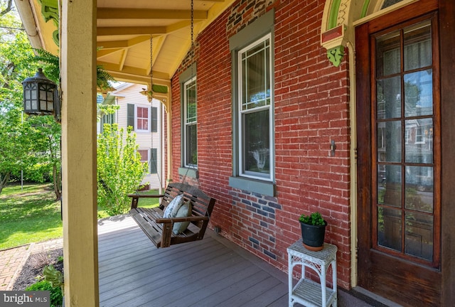 wooden deck featuring a porch
