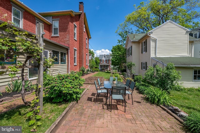 view of patio featuring outdoor dining space