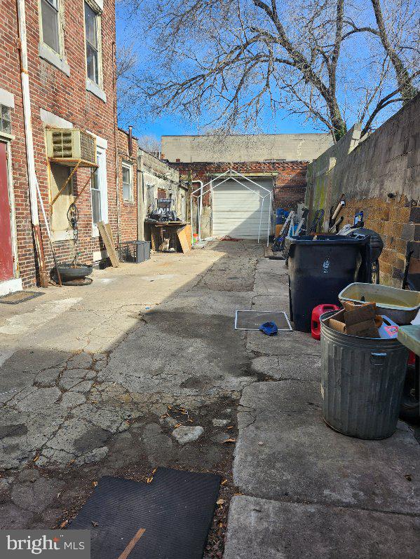 view of asphalt alley