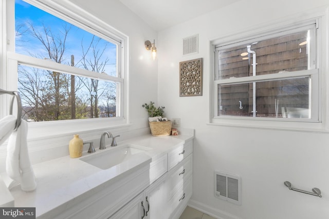5721 Euclid St, Landover, MD 20785 - bathroom with vanity and baseboards