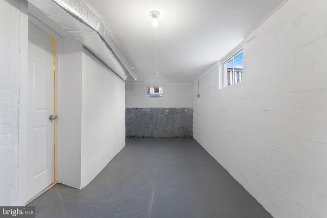 5721 Euclid St, Landover, MD 20785 - basement featuring healthy amount of natural light and concrete block wall