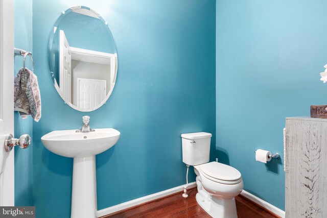 27 Hopkins Branch Way, Fredericksburg, VA 22406 - half bath featuring wood finished floors and toilet