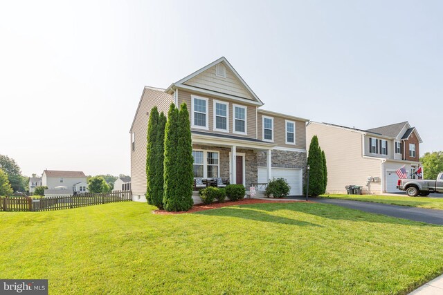 27 Hopkins Branch Way, Fredericksburg, VA 22406 - view of front of property featuring an attached garage, stone siding, and driveway