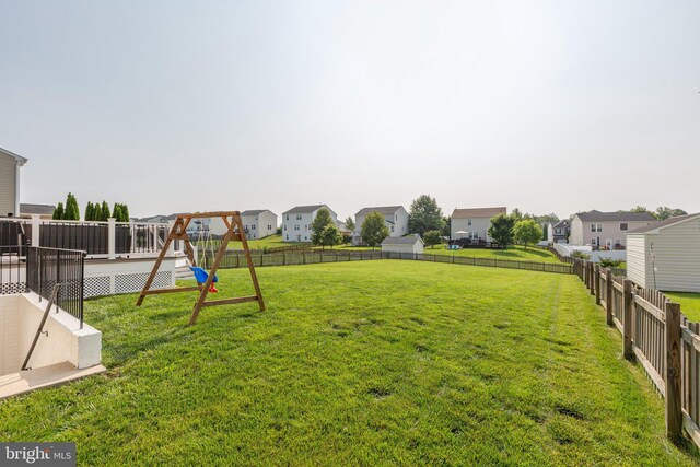 27 Hopkins Branch Way, Fredericksburg, VA 22406 - fenced backyard with a residential view, a playground, and a wooden deck