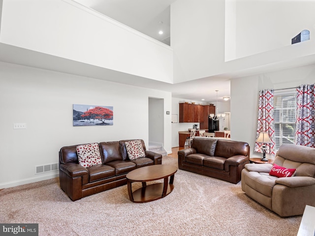 1711 Butternut Cir, West Chester, PA 19382 - living area featuring a towering ceiling, light carpet, baseboards, and recessed lighting