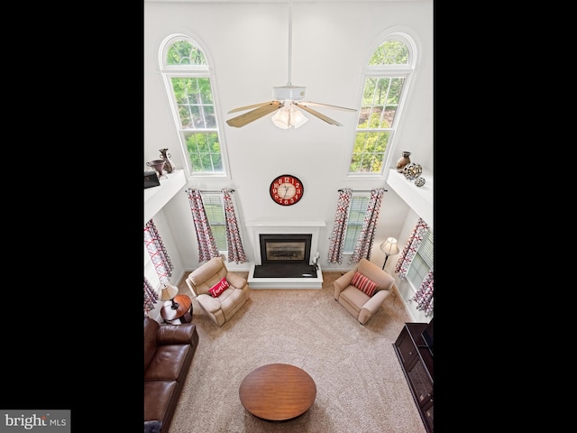 1711 Butternut Cir, West Chester, PA 19382 - playroom featuring plenty of natural light, ceiling fan, a glass covered fireplace, and carpet