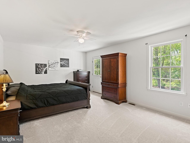 1711 Butternut Cir, West Chester, PA 19382 - bedroom featuring light carpet, baseboards, and a ceiling fan