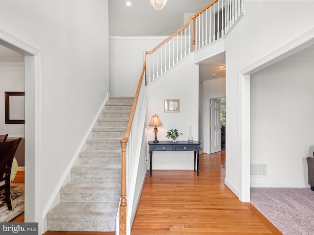 1711 Butternut Cir, West Chester, PA 19382 - stairs featuring wood finished floors and baseboards