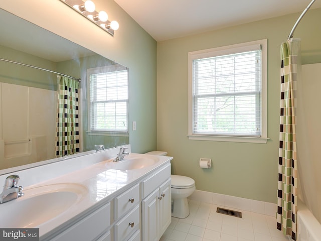 1711 Butternut Cir, West Chester, PA 19382 - bathroom featuring healthy amount of natural light, toilet, double vanity, and baseboards