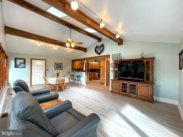 8408 Alvin Rd, Pasadena, MD 21122 - living area with light wood finished floors, baseboards, and ceiling fan