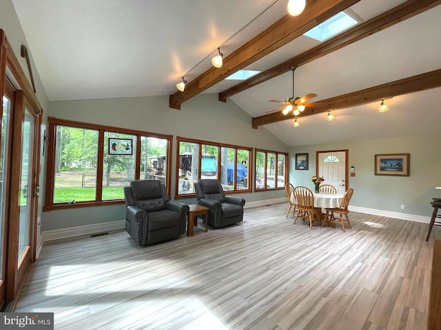 8408 Alvin Rd, Pasadena, MD 21122 - living room with baseboards, light wood-style flooring, and plenty of natural light