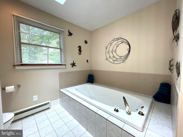 8408 Alvin Rd, Pasadena, MD 21122 - full bath featuring a baseboard heating unit, a garden tub, tile patterned floors, and baseboards