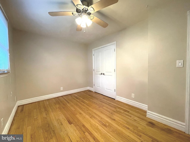 8408 Alvin Rd, Pasadena, MD 21122 - unfurnished room with light wood-style flooring, baseboards, and ceiling fan