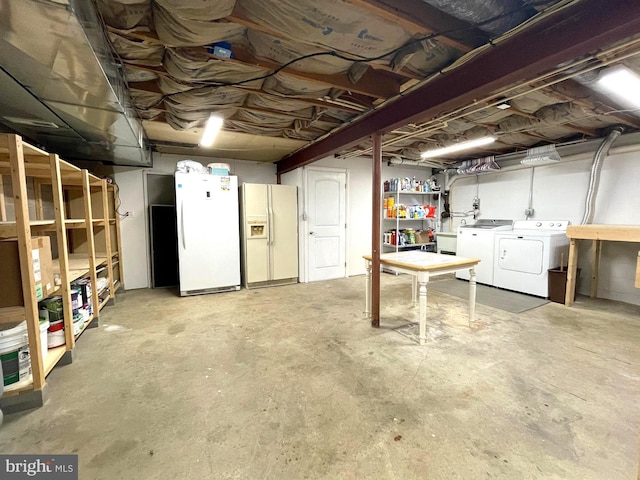 8408 Alvin Rd, Pasadena, MD 21122 - unfinished basement featuring white fridge with ice dispenser, freestanding refrigerator, and washing machine and dryer