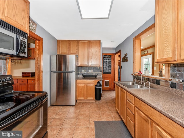 6103 Jefferson Pike, Frederick, MD 21703 - kitchen with stainless steel appliances, tasteful backsplash, a sink, and light tile patterned floors