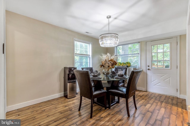 320 Bala Ter W, West Chester, PA 19380 - dining room with a chandelier, wood finished floors, and baseboards