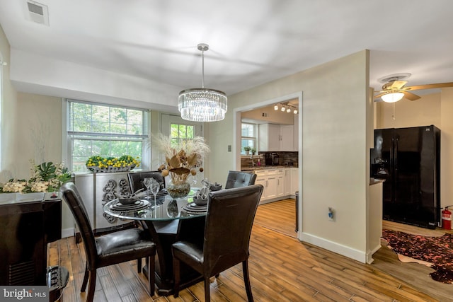 320 Bala Ter W, West Chester, PA 19380 - dining area with a chandelier, light wood-type flooring, and a ceiling fan