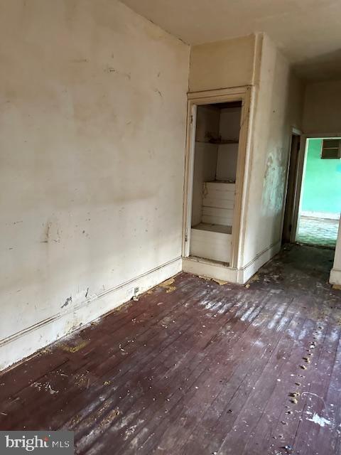 unfurnished bedroom featuring wood-type flooring