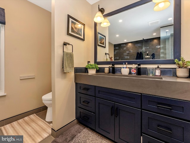 24129 Pecan Grove Ln, Gaithersburg, MD 20882 - bathroom featuring vanity, toilet, recessed lighting, tiled shower, and baseboards