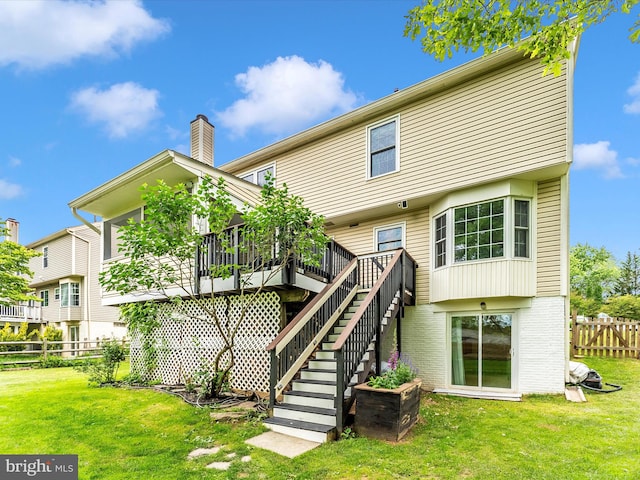 24129 Pecan Grove Ln, Gaithersburg, MD 20882 - back of house featuring a chimney, a deck, brick siding, and stairs