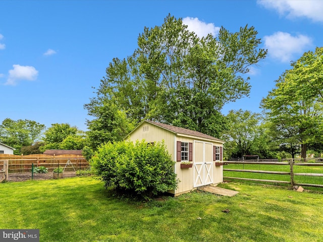 24129 Pecan Grove Ln, Gaithersburg, MD 20882 - view of shed with a vegetable garden