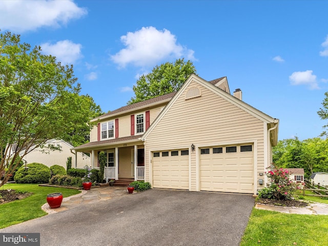 24129 Pecan Grove Ln, Gaithersburg, MD 20882 - view of front of house with asphalt driveway, an attached garage, covered porch, a chimney, and a front yard