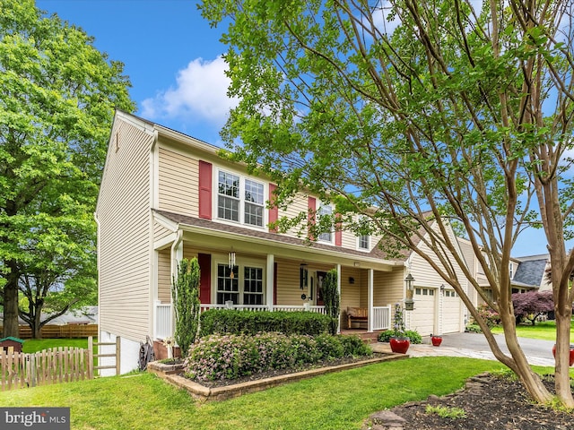 24129 Pecan Grove Ln, Gaithersburg, MD 20882 - traditional-style house featuring covered porch, a garage, and driveway