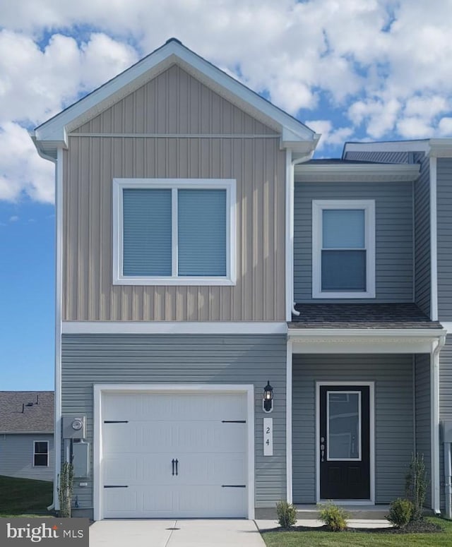 24 Cramsford St, Falling Waters, WV 25419 - view of front of home with an attached garage, board and batten siding, driveway, and covered porch