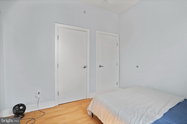 809 6th St NW Unit 63, Washington, DC 20001 - bedroom featuring wood finished floors and baseboards
