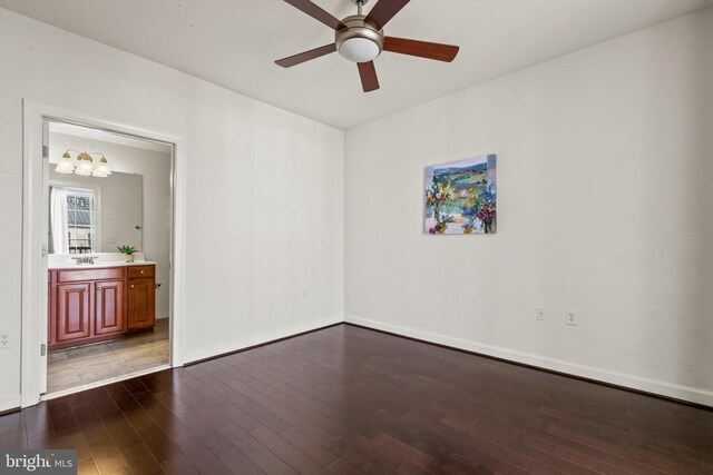 400 Cameron Station Blvd Unit 417, Alexandria, VA 22304 - empty room featuring hardwood / wood-style floors, ceiling fan, a chandelier, baseboards, and a sink