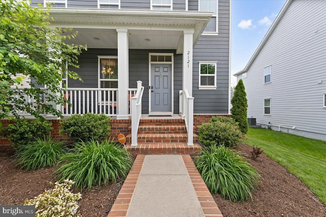 2121 River Heritage Blvd, Dumfries, VA 22026 - entrance to property with covered porch and central AC