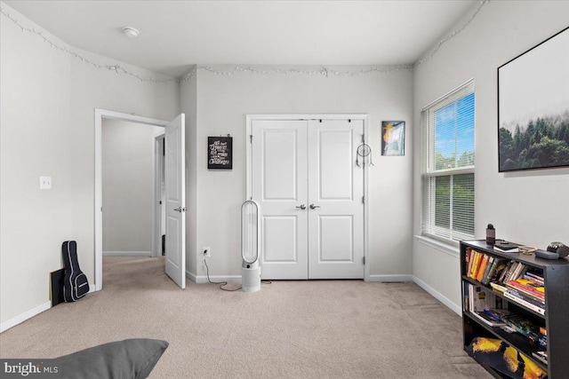 2121 River Heritage Blvd, Dumfries, VA 22026 - carpeted bedroom with baseboards and a closet