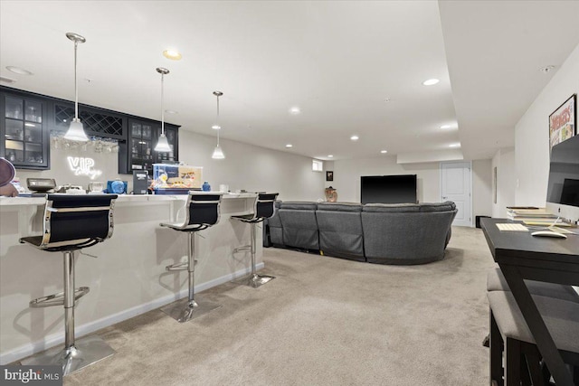 2121 River Heritage Blvd, Dumfries, VA 22026 - living area featuring bar area, light carpet, recessed lighting, and baseboards