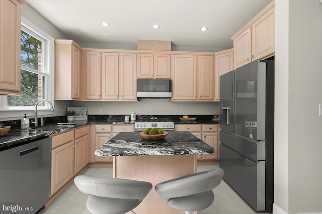 1252 Harbor Island Walk, Baltimore, MD 21230 - kitchen featuring stainless steel fridge, dishwasher, light brown cabinets, white gas range, and a sink