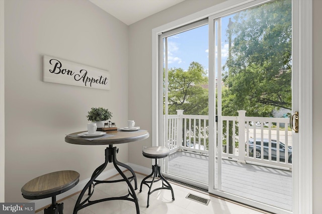 1252 Harbor Island Walk, Baltimore, MD 21230 - dining space with baseboards and tile patterned floors