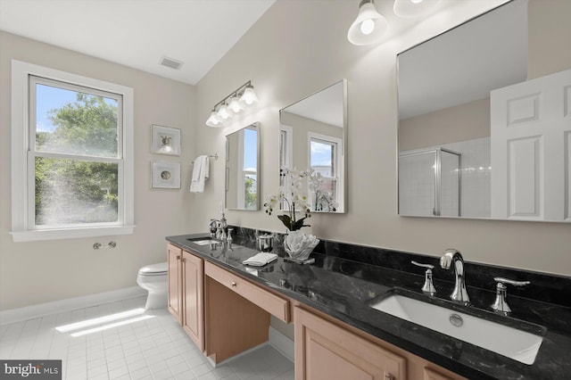 1252 Harbor Island Walk, Baltimore, MD 21230 - bathroom with a shower stall, baseboards, tile patterned flooring, toilet, and double vanity