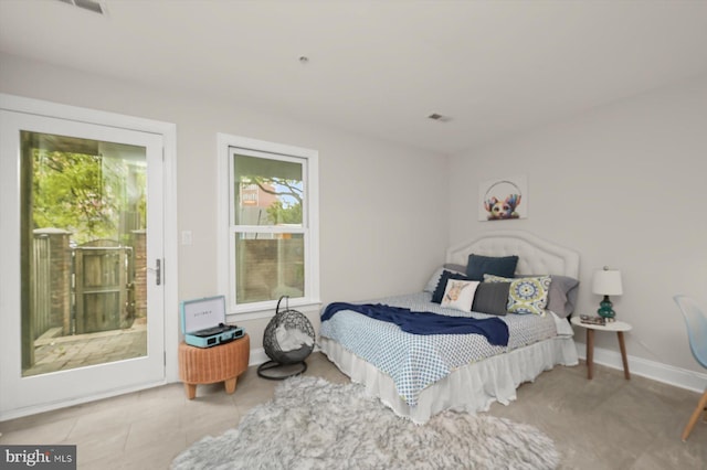 1252 Harbor Island Walk, Baltimore, MD 21230 - bedroom featuring baseboards and access to outside