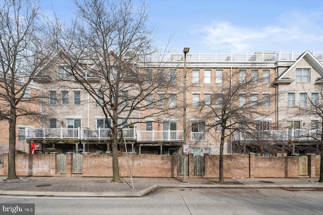 1252 Harbor Island Walk, Baltimore, MD 21230 - view of apartment building / complex featuring fence