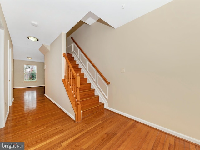 18312 Bailiwick Pl, Germantown, MD 20874 - stairs featuring wood finished floors and baseboards