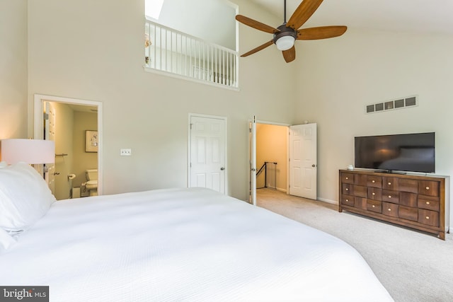 517 Bullock Unit 13, Conshohocken, PA 19428 - carpeted bedroom with a towering ceiling, connected bathroom, baseboards, and a ceiling fan
