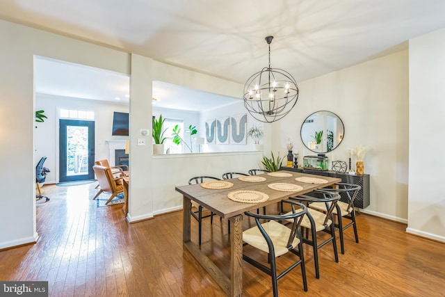 517 Bullock Unit 13, Conshohocken, PA 19428 - dining room with hardwood / wood-style flooring, a chandelier, and baseboards