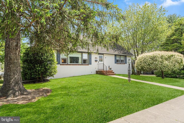 205 Mount Vernon Ave, Laurel Springs, NJ 08021 - view of front of home with a front yard, stucco siding, and a shingled roof