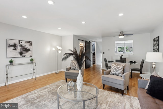 835 Sabina Cir, Bear, DE 19701 - living room with a barn door, wood finished floors, baseboards, recessed lighting, and a ceiling fan